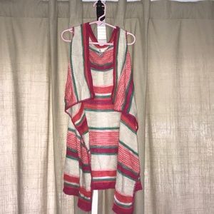 A beautiful, colorful, and sleeveless jacket.